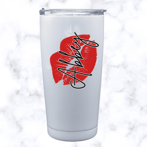 White 20oz stainless steel tumbler with a red lip print and the name